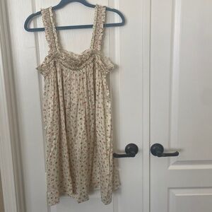 Doen dress with tags.